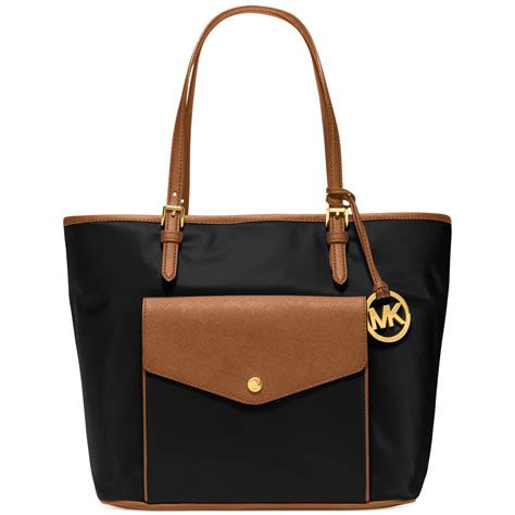 michael michael kors jet set travel md multifunction tote black|Michael Kors jet set luggage.